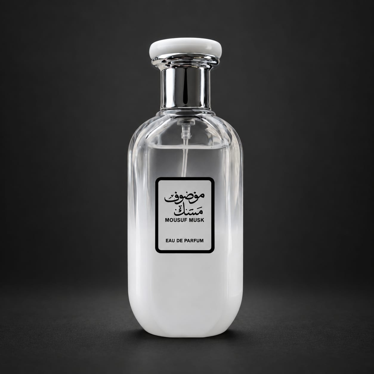 Frasco transparente e branco do perfume Mousuf Musk